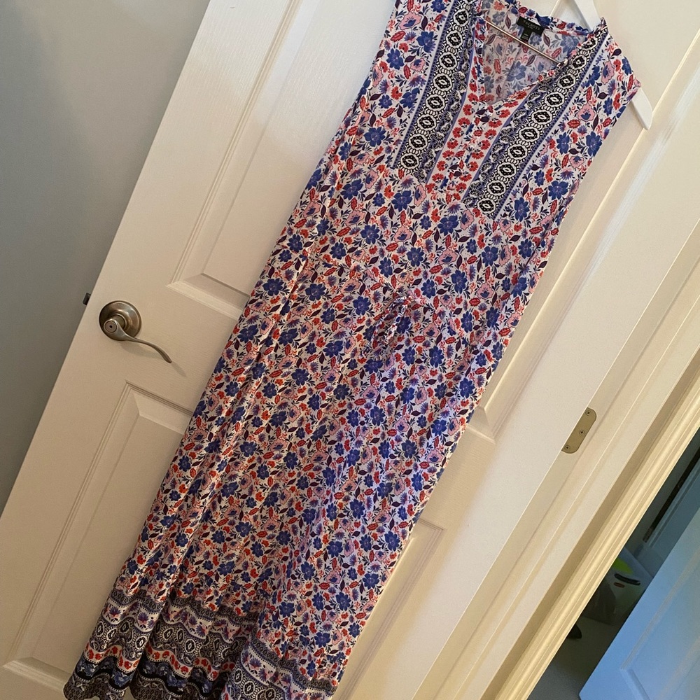 Light and airy maxi dress. Throw on jean jacket to take to fall.